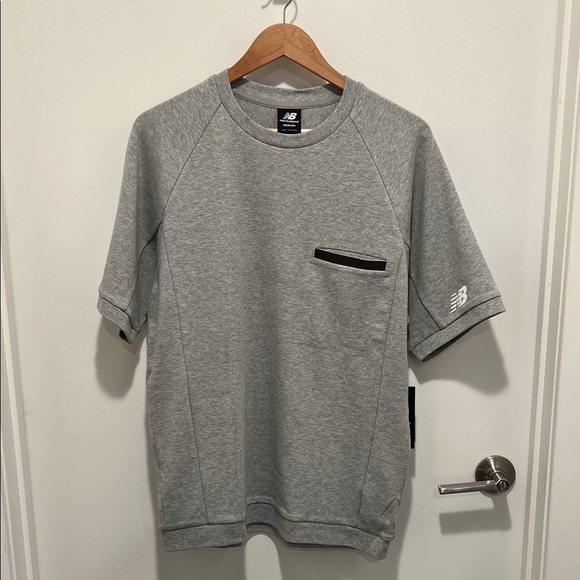 New Balance - Men's Heather Gray Shortsleeve Sweatshirt with Black Accents - Picture 1 of 5